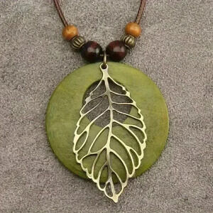 Bohemian Style Wooden Pendant Necklace With Hollow Leaf Charm